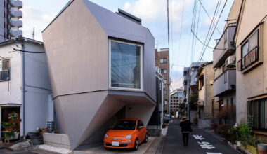 why japanese architects carve parking into tiny urban homes