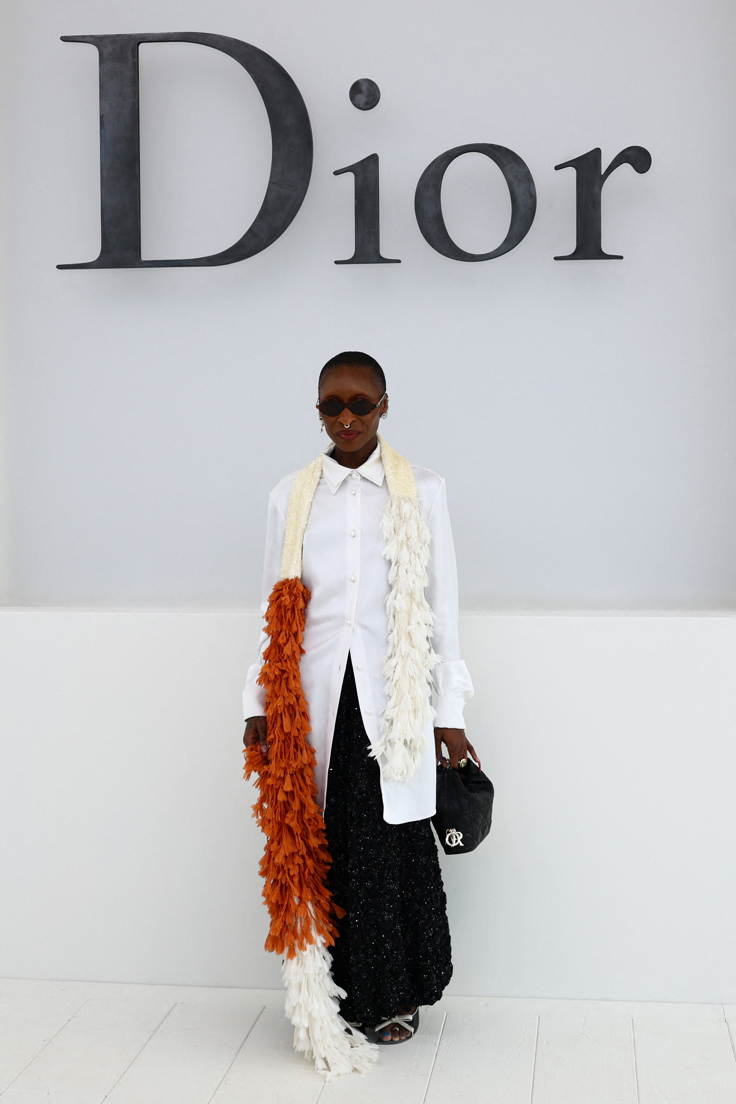 Cynthia Erivo posing at a photocall before the Dior Spring/Summer 2027 Women's ready-to-wear collection show.