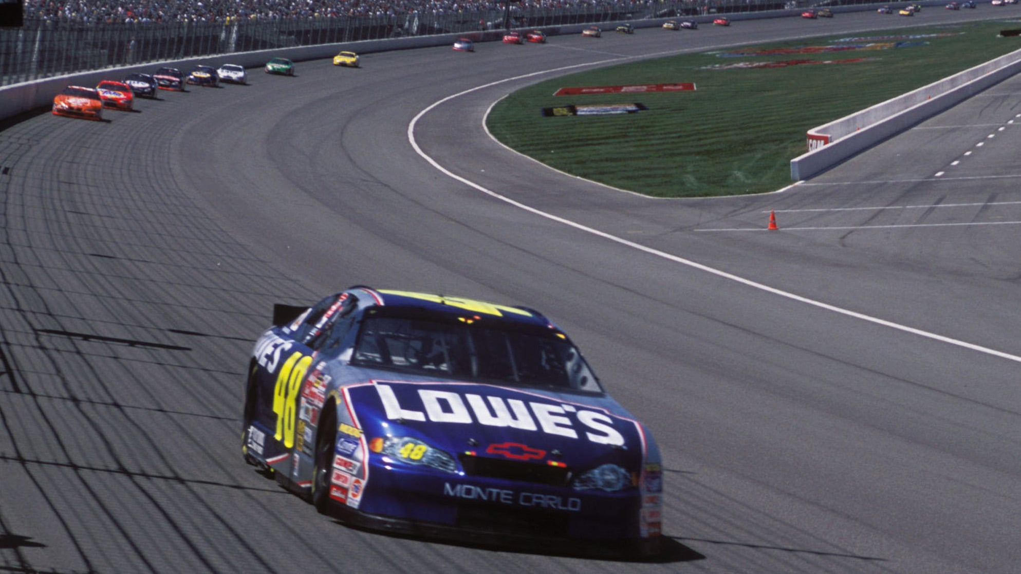 Johnson extends his lead of the 
NASCAR Winston Cup NAPA Auto Parts 500 race at California Speedway, on his way to scoring his first NASCAR victory in his rookie season, April 2002.
