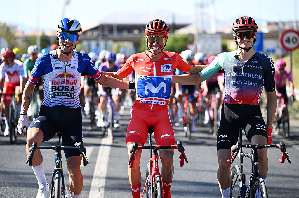GRANADA, SPAIN - SEPTEMBER 13: (L-R) Primoz Roglic of Slovenia and Team Red Bull - BORA - hansgrohe on second place, race winner Enric Mas of Spain and Movistar Team - Red Leader Jersey and Felix Gall of Austria and Team Decathlon CMA CGM on third place pose during the La Vuelta - 81st Tour of Spain 2026, Stage 21 a 112km stage from Granada to Granada / #UCIWT / on September 13, 2026 in Granada, Spain. (Photo by Tim de Waele/Getty Images)