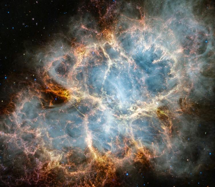 A photo of a massive cloud of gas and stars in space.