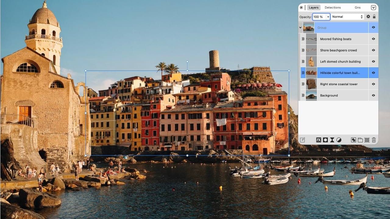 A photo-editing interface showing a coastal Italian town with a layers panel listing separated elements including moored fishing boats, a beachgoers crowd, a domed church and a hillside building.