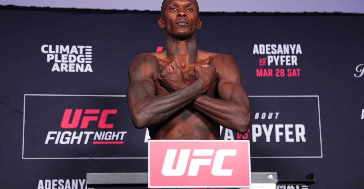 Israel Adesanya arrives in Australia to train with Alexander Volkanovski