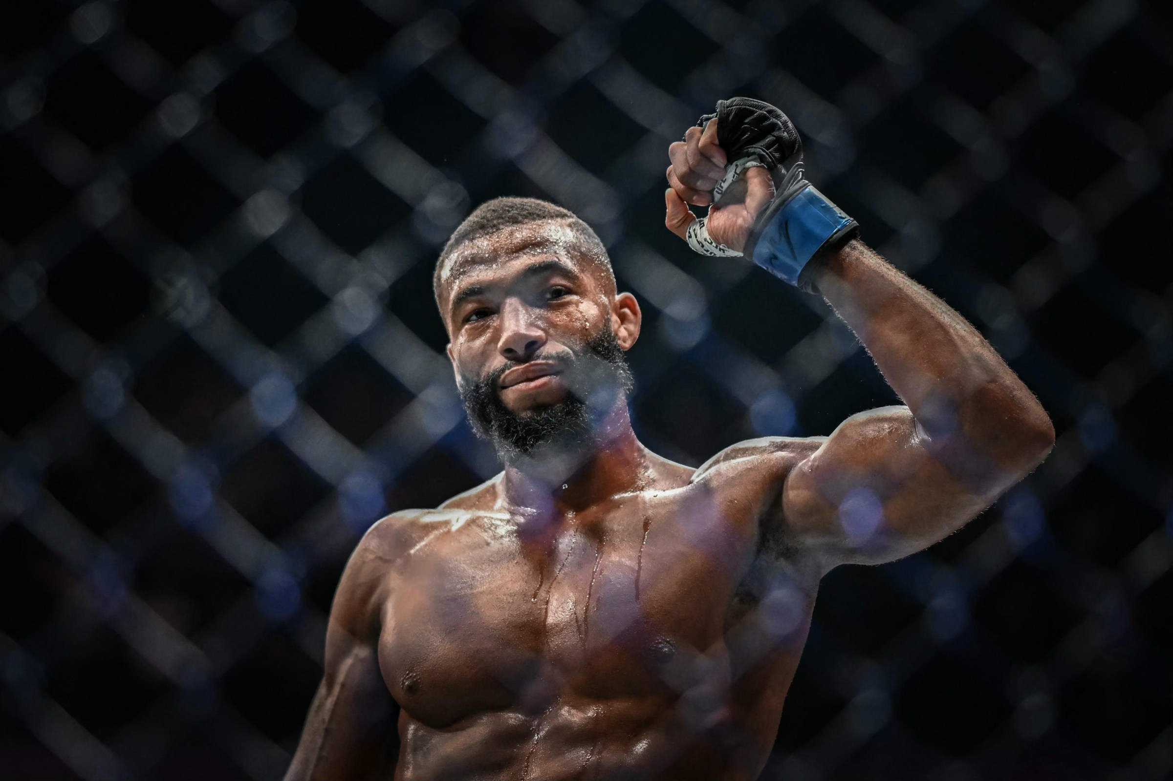 French Salahdine Parnasse celebrates after winning against New Zealand Dan Hooker during the lightweight division of their mixed martial arts (MMA) fight at the 5th edition of the Ultimate Fighting Championship (UFC) at the Bercy Accor Arena, in Paris, on September 5, 2026. (Photo by LOU BENOIST / AFP via Getty Images)