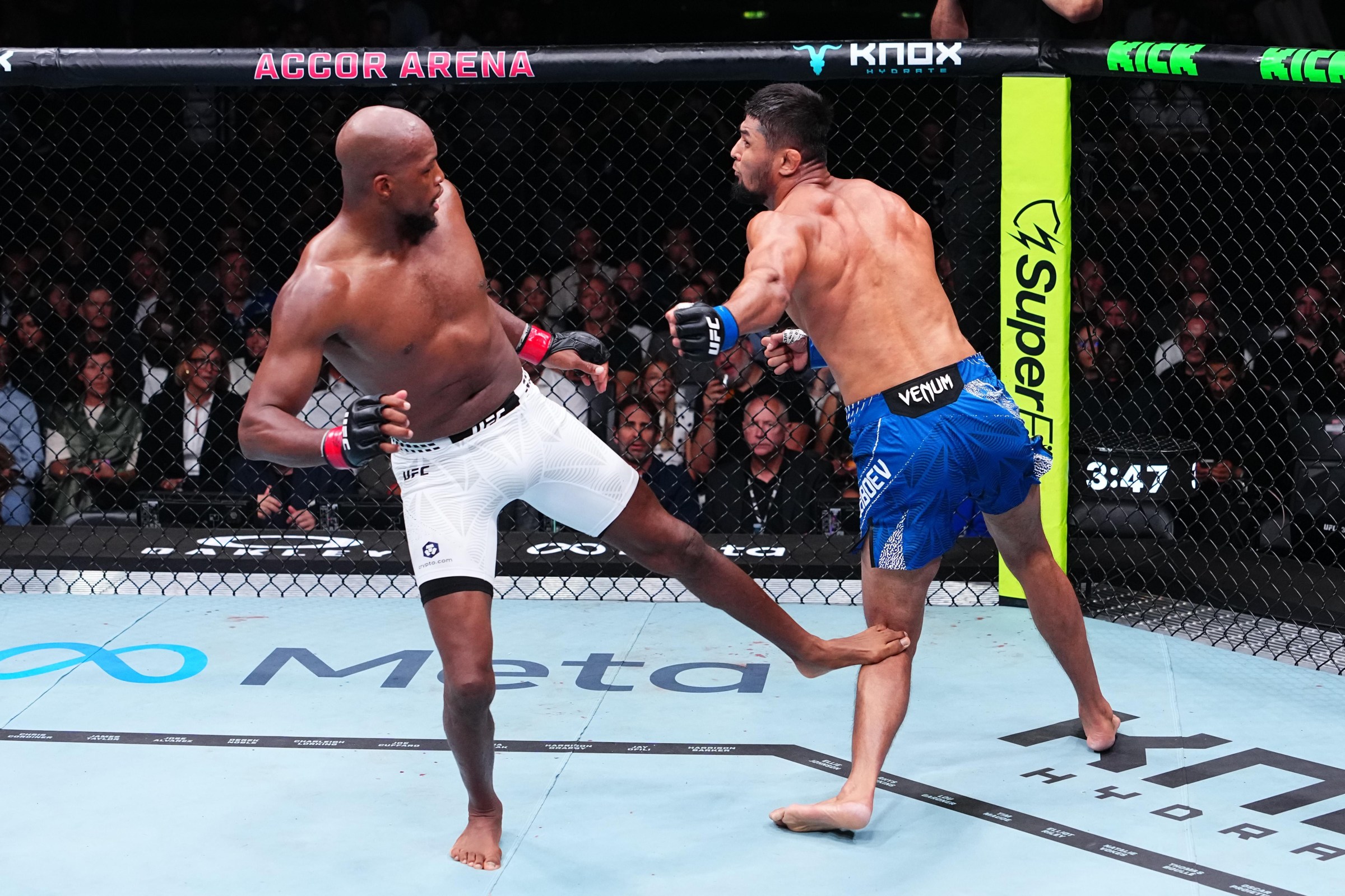 PARIS, FRANCE - SEPTEMBER 05: (L-R) Michael Page of England kicks Nursulton Ruziboev of Uzbekistan in their middleweight fight during the UFC Fight Night event at The Accor Arena on September 05, 2026 in Paris, France. (Photo by Jeff Bottari/Zuffa LLC)