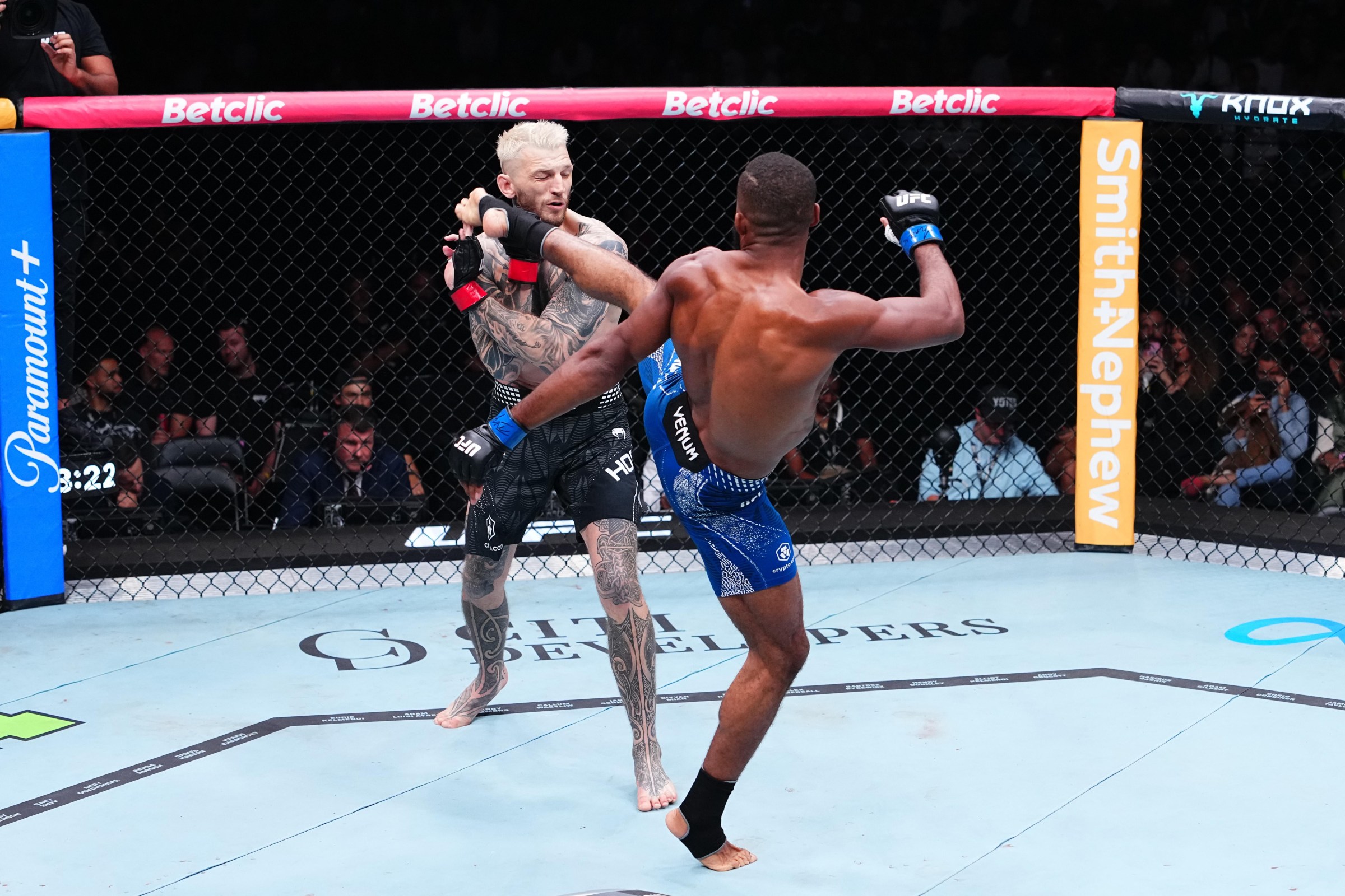 PARIS, FRANCE - SEPTEMBER 05: (R-L) Salahdine Parnasse of France kicks Dan Hooker of New Zealand in their middleweight fight during the UFC Fight Night event at The Accor Arena on September 05, 2026 in Paris, France. (Photo by Jeff Bottari/Zuffa LLC)