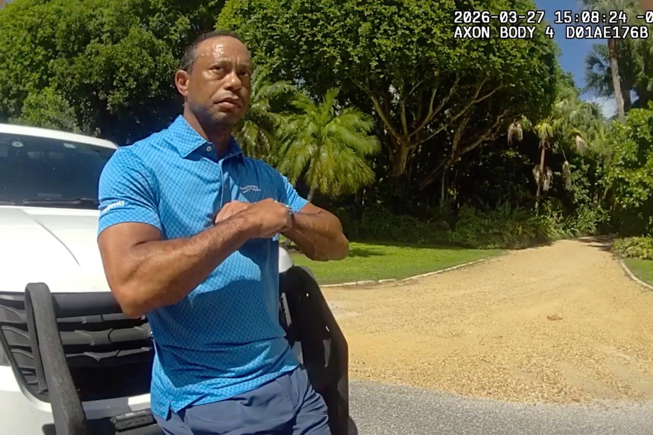 In this photo from police body camera video, Tiger Woods performs a field sobriety test following a car crash on Jupiter Island, Florida, on 27 March 2026.