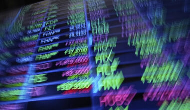 Stock markets slide amid the release of labour data in Canada and the U.S.