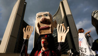 Hundreds march in Toronto against Carney's investment summit