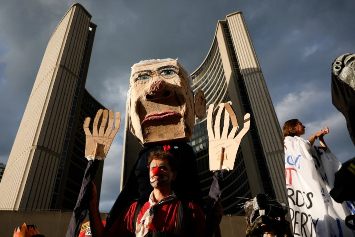 Hundreds march in Toronto against Carney's investment summit