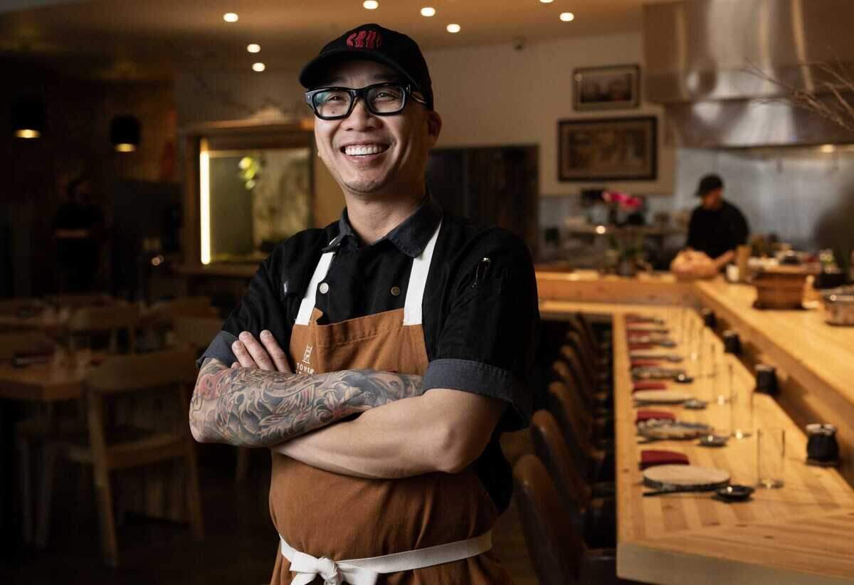 Chef Billy Ngo, cofounder, chef and partner of Kru Contemporary Japanese Cuisine poses for a portrait inside the restaurant in March 2024.