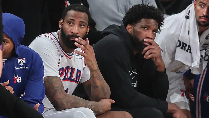 Knicks center addition Andre Drummond sits with Joel Embiid during a 2026 playoff game