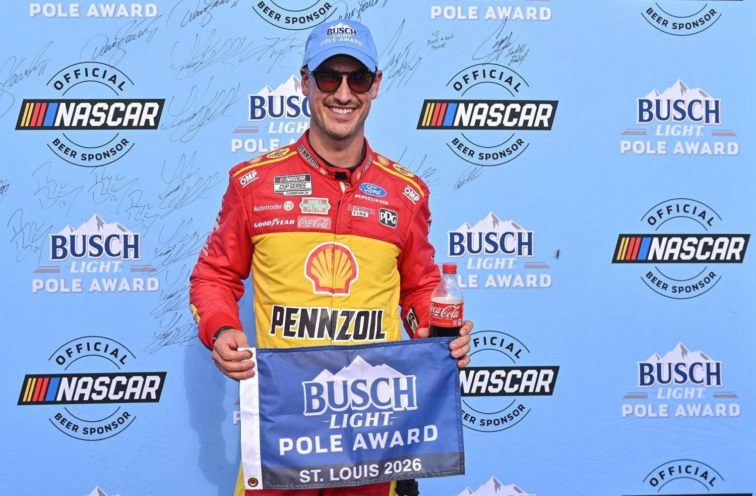 Joey Logano, driver of the #22 Shell Pennzoil Ford, poses for photos after winning the pole award during qualifying for the NASCAR Cup Series Cook Out Southern 500 at WWT Raceway on September 12, 2026 in Madison, Illinois. (Photo by Amy Kontras/Getty Images for NASCAR)