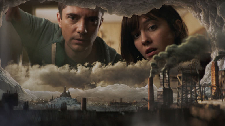 Topher Grace and Mary Elizabeth Winstead as Rob and Gail looking at a tiny civilization in their fridge in Love, Death, and Robots