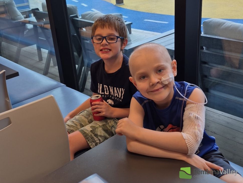 Logan and Maverick in a hospital cafeteria