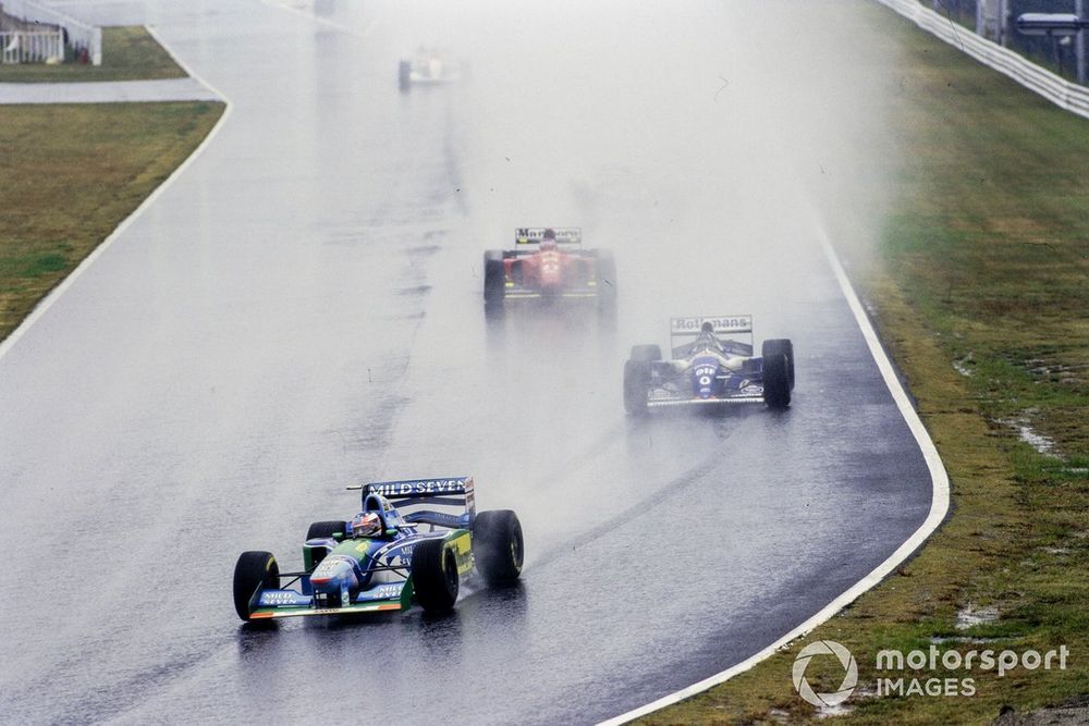 Michael Schumacher, Benetton B194 Ford, leads Damon Hill, Williams FW16B Renault, and Jean Alesi, Ferrari 412T1B