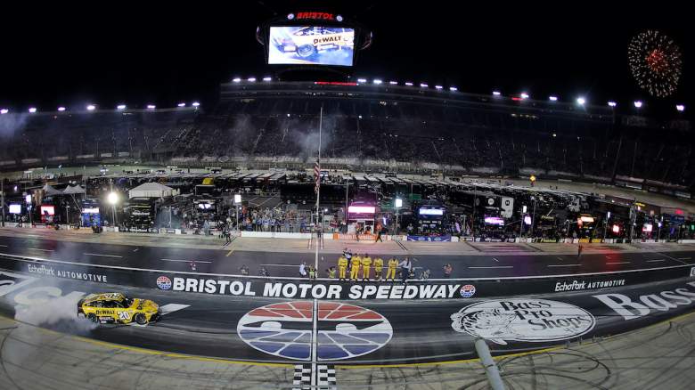Christopher Bell, driver of the #20 DEWALT Toyota, celebrates with a burnout