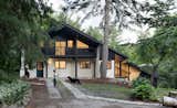 A Massive New Roof Turns a ’70s Chalet in Canada Into a Forest Palace - Photo 1 of 20 - 