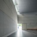© Tai Ngo Phan Chau Trinh Sports Hall / scale50 - Interior Photography, Concrete
