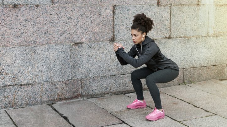 runner doing a squat