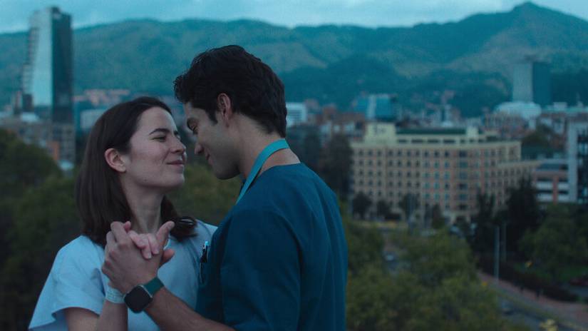 Two people dancing on a rooftop in Stolen Heartbeats