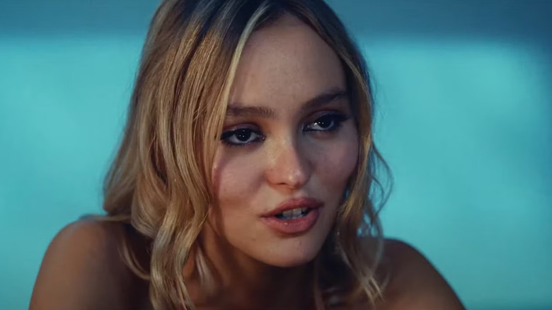Lily Rose-Depp as Jocelyn smiling while talking in The Idol