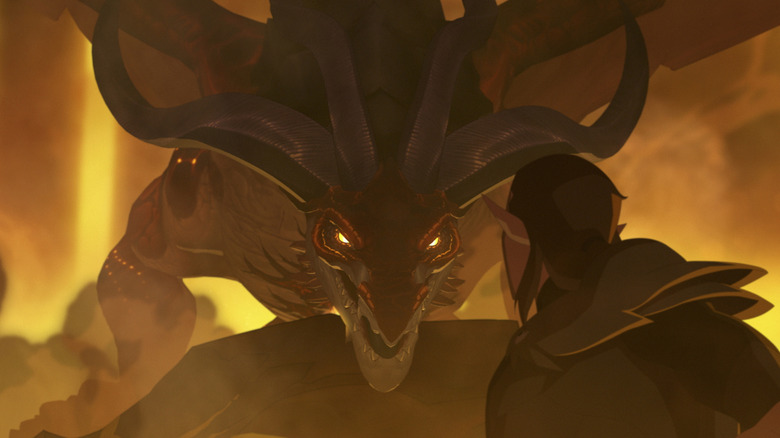Thordak in a fire-lit room in 