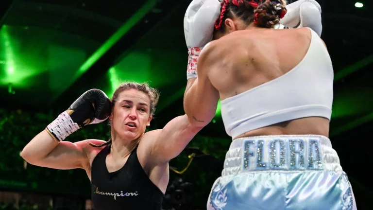 Katie-Taylor-Defeats-Flora-Pili-to-Become-Three-Time-Undisputed-Champion-in-Front-of-80,000-at-Croke-Park.jpg