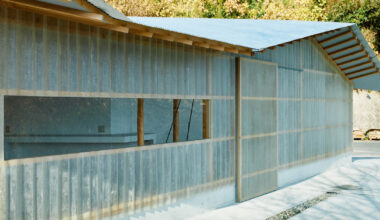 triangular timber structure encloses tsukumo kiln ceramic studio in japan