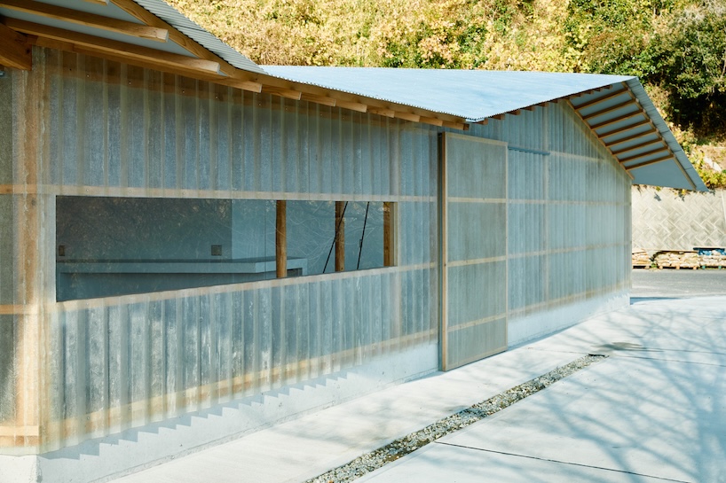 triangular timber structure encloses tsukumo kiln ceramic studio in kobe, japan - 1