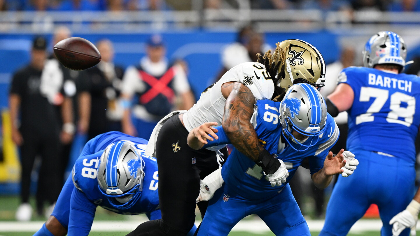 Saints-Lions included controversial reversal of strip-sack-score