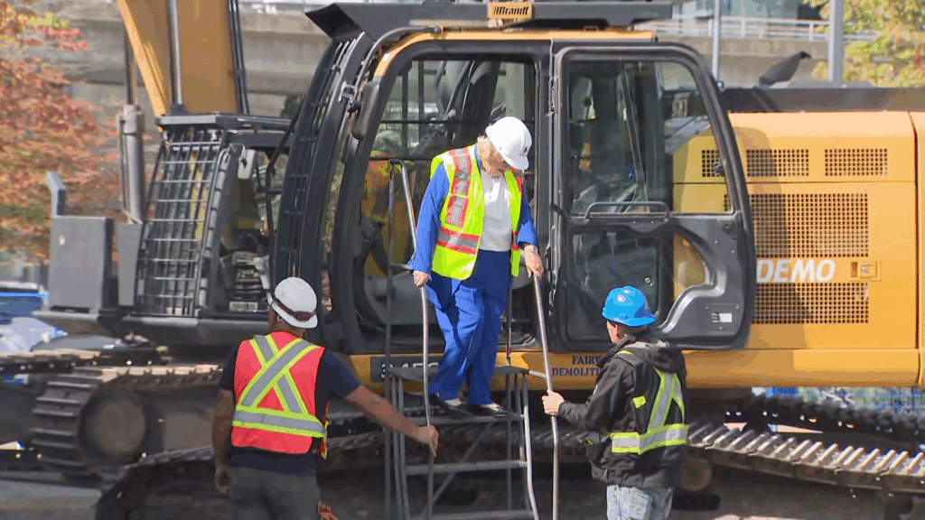 Demolition has begun at an old grocery store building at King George Boulevard and 104th Avenue in Surrey, to make way for a proposed 10,000-seat arena and the development of Surrey's entertainment district.