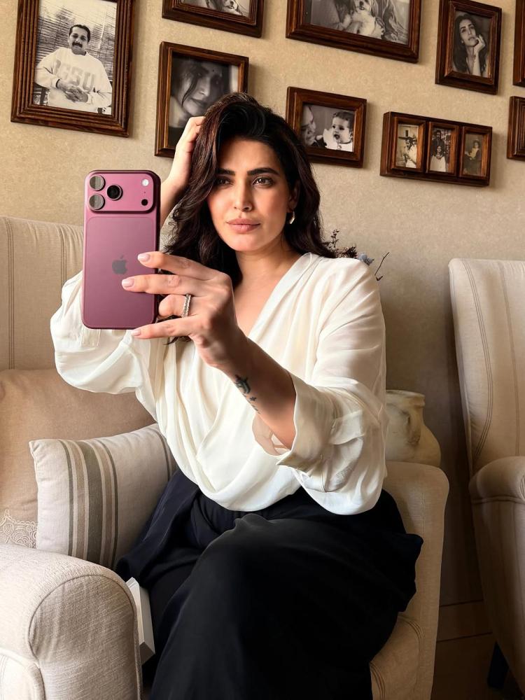Karishma Tanna with her iPhone Karishma Tanna with her iPhone