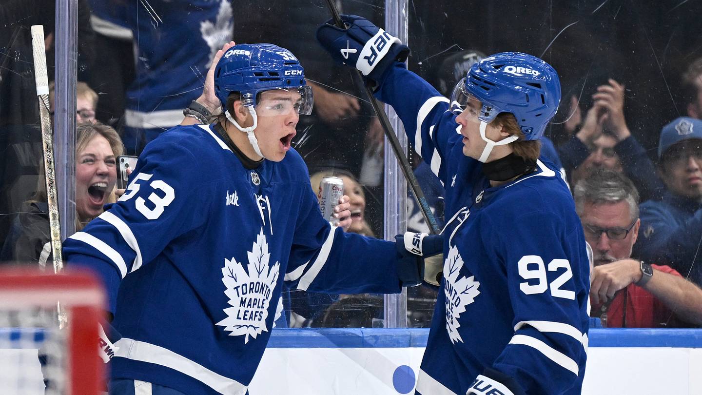 Sep 30, 2026; Toronto, Ontario, CAN;  Toronto Maple Leafs forward Easton Cowan (53) celebrates with forward Gavin McKenna (92) after scoring a goal against the New York Islanders in the first period at Scotiabank Arena.  Mandatory Credit: Dan Hamilton-Imagn Images