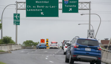 Signs on Highway 20 in Montreal show exits for Montreal and another for Toronto