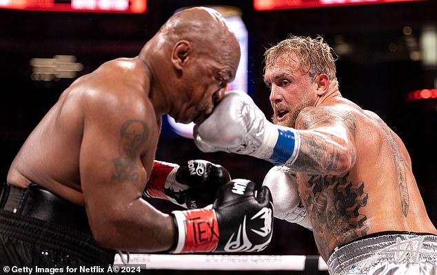 The boxer is accused of unlawfully pulling out of the campaign after learning he would fight YouTuber-turned-boxer Jake Paul in a £15million exhibition match (pictured)