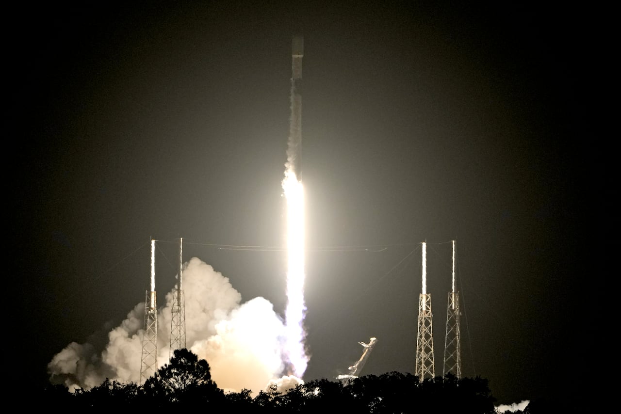 A SpaceX Falcon 9 rocket with a payload of Starlink V2 Mini internet satellites lifts off from Launch Complex 40 at the Cape Canaveral Space Force Station in Cape Canaveral, Fla., Sunday, July 23, 2023. (AP Photo/John Raoux)
