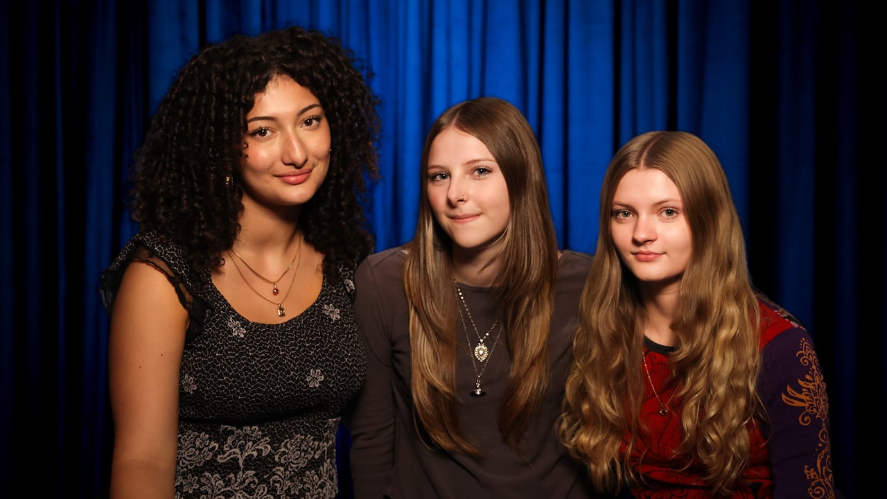 Headshot of the trio Thunder Queens.