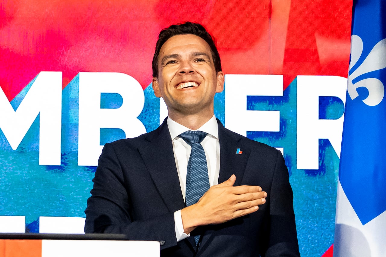 Quebec Liberal Party leader Charles Milliard celebrates on stage, on election day in North Hatley, Que., on Monday, Oct. 5, 2026.