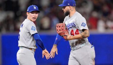 Los Angeles Dodgers shortstop Kim Hye-seong  and Los Angeles Dodgers center fielder Andy Pages celebrate winning Game 4 of baseball