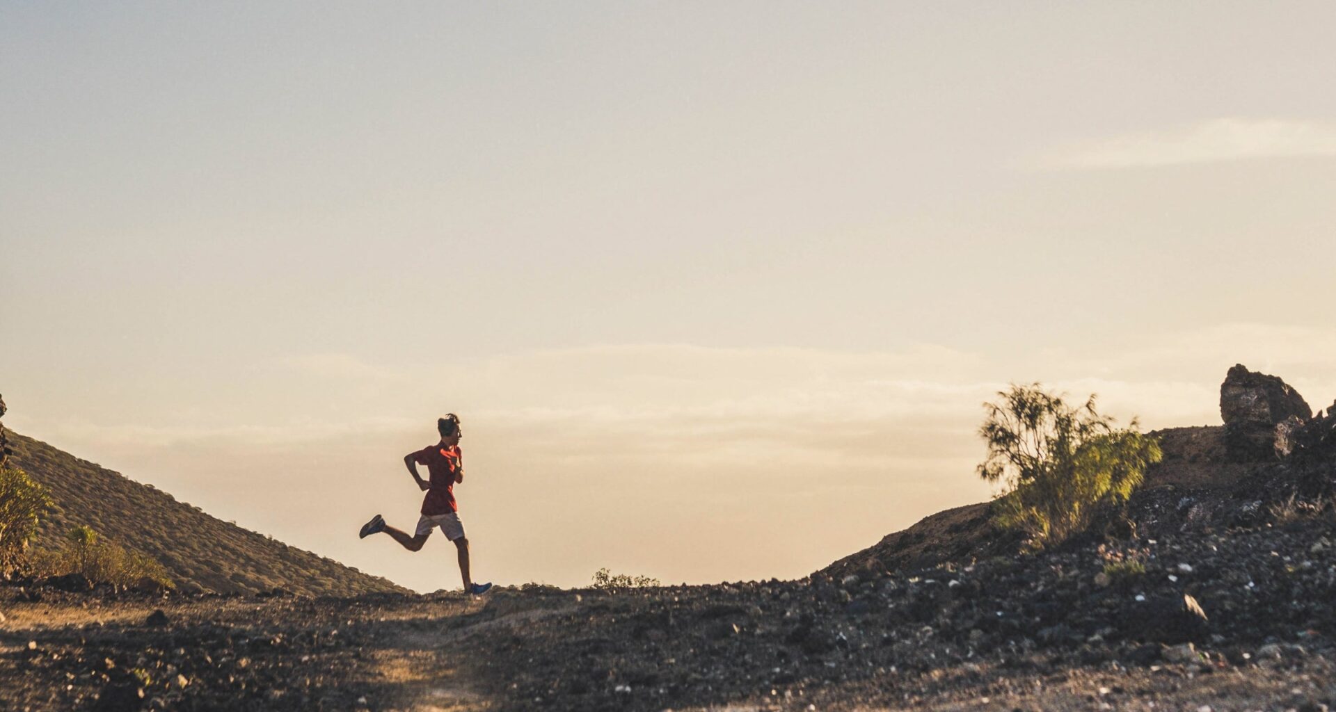 person running on a trail