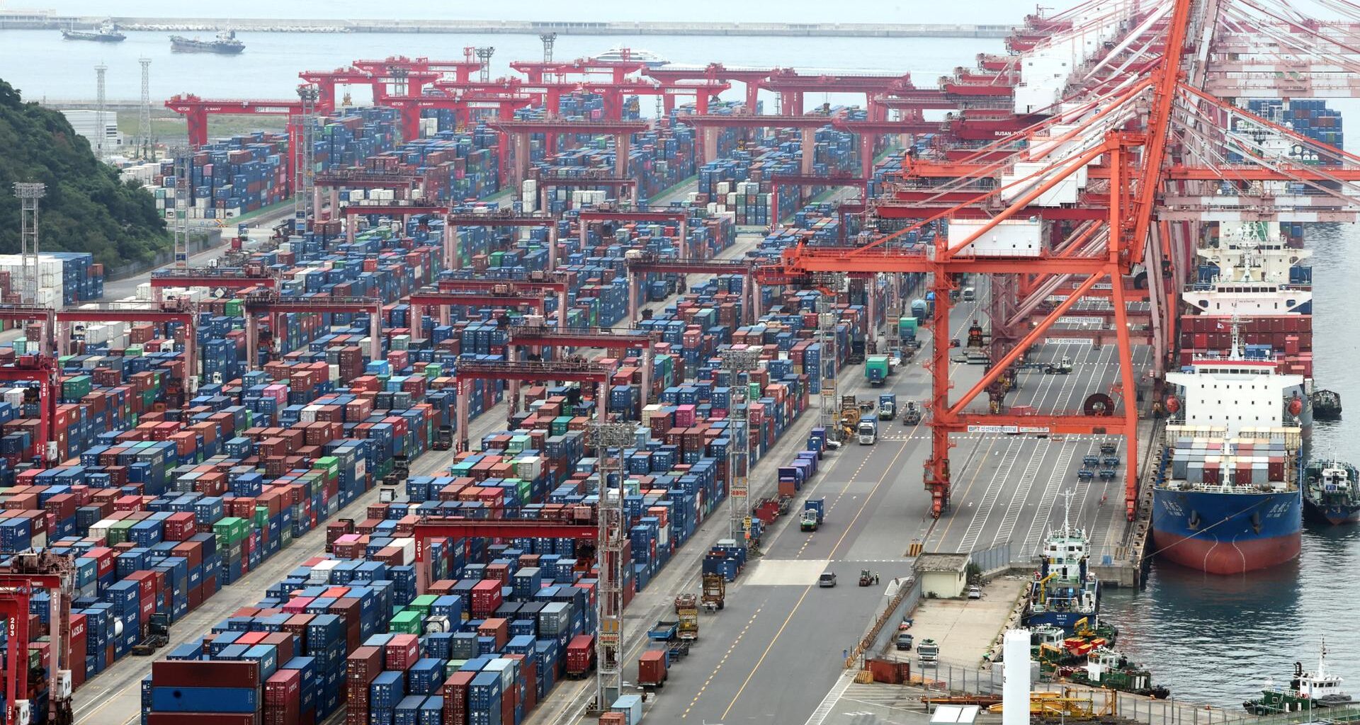 Containers are stacked at a port in the southeastern city of Busan, Oct. 1. Yonhap