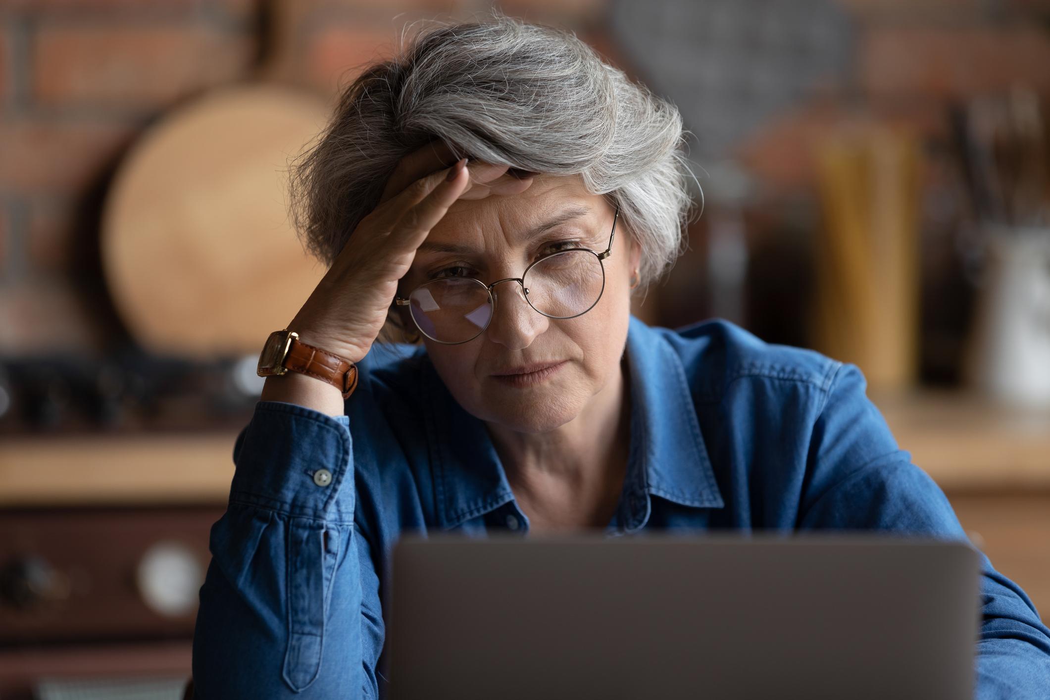 A person at a laptop.