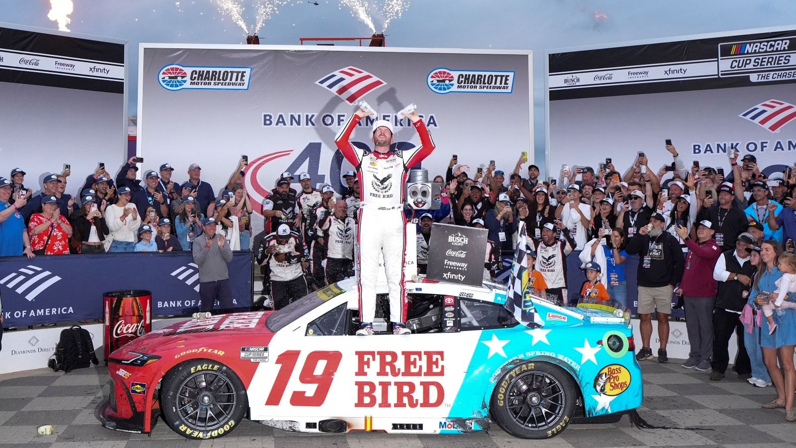 Oct 11, 2026; Concord, North Carolina, USA; Joe Gibbs Racing driver Chase Briscoe (19) and his crew celebrate the win during the Bank of America 400 at Charlotte Motor Speedway Road Course.