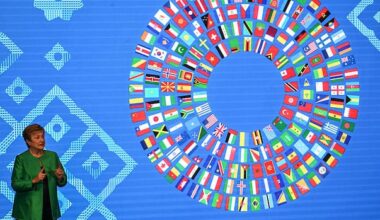 IMF warns of risks from AI boom and debt, but raises forecast for world growth