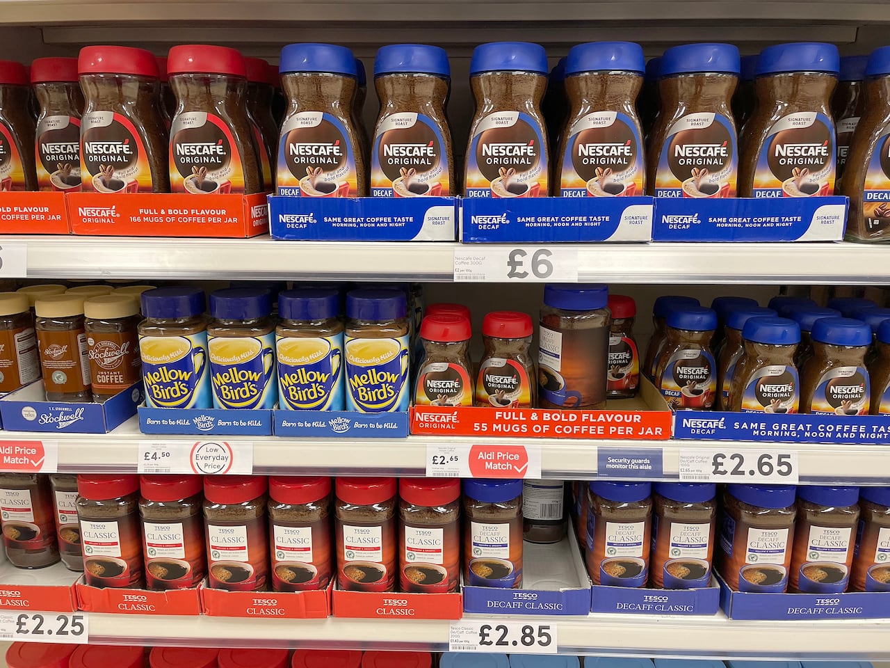 A store shelf full of instant coffee