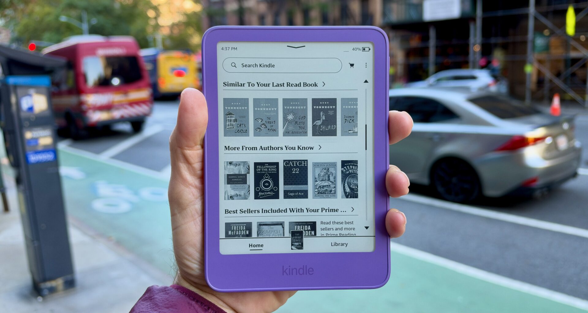 Close of the base Kindle in ube color held in the reviewer