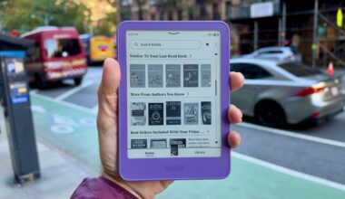 Close of the base Kindle in ube color held in the reviewer