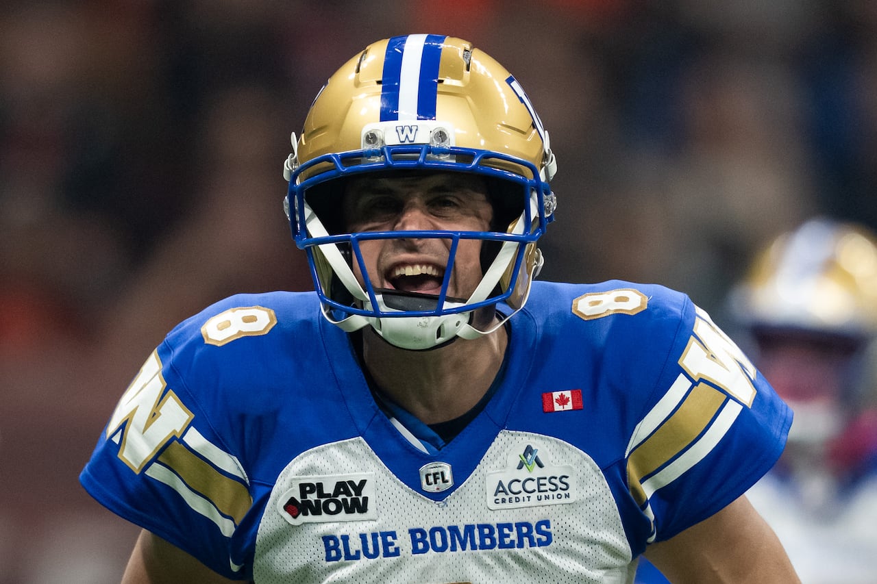 Close-up photo of Zach Collaros shouting.