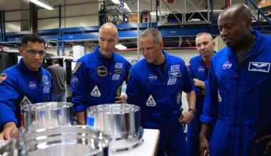 In this photo provided by NASA, from left, NASA astronaut Frank Rubio, ESA (European Space Agency) astronaut Luca Parmitano, and NASA astronauts Bob Hines, Randy Bresnik, and Andre Douglas visit the Prototype Development Laboratory at NASA's Kennedy Space Center in Florida on Wednesday, Sept. 2, 2026.